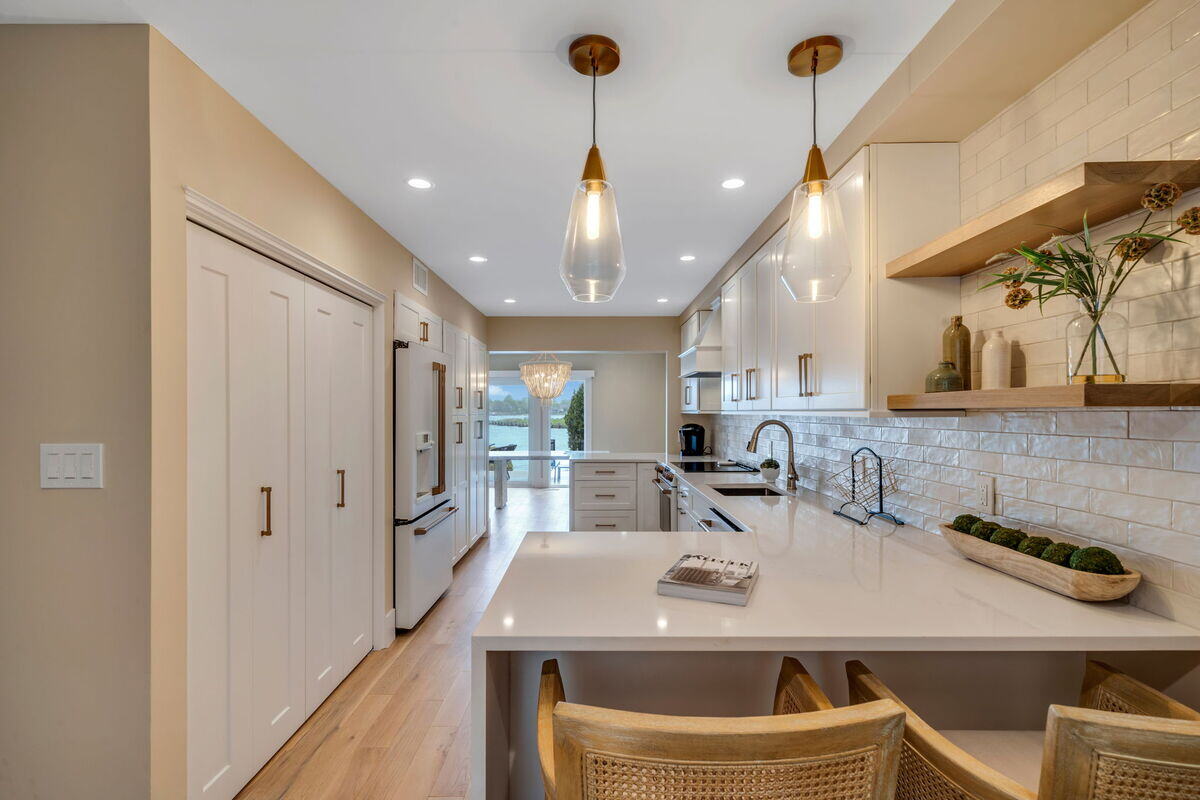 Islip, NY kitchen remodel with white brick backsplash by Kuhn Construction