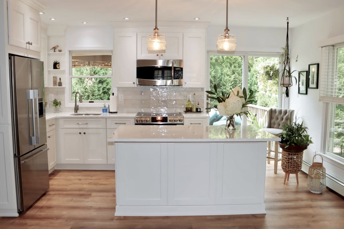 gould white kitchen with windows and shelves
