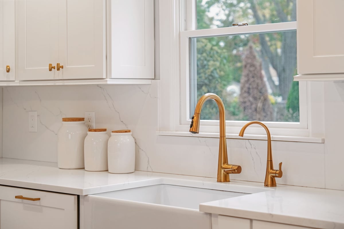 white kitchen with gold fixtures